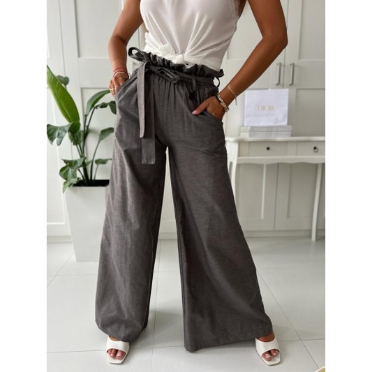 Womens Flare pants in graphite  https://www.toromoda.com/products/womens-flare-pants-in-graphite  Unique trousers with wide legs, elastic waist, belt, side pockets.Material: textile without elastaneOrigin: BG