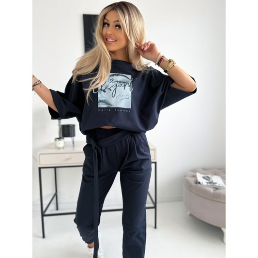 Women's two pieces set Kate in dark blue  https://www.toromoda.com/products/womens-set-kate-in-dark-blue  Two-piece set: loose blouse with boat neck and pants with pockets, elastic waist, ties. Material: cotton with elastane Origin: ToroModa