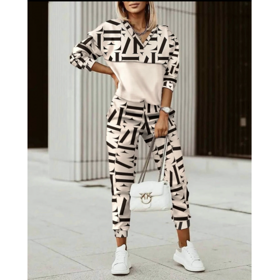 Women's set Julia in two pieces  https://www.toromoda.com/products/womens-set-julia  Set of two parts: sweatshirt top with hood, hem with tie and stoppers and pants with cuffs, elastic waist and side pockets. Fabric: cotton, elastane