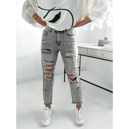 Womans Ripped Fit Gray Denim Jeans  https://www.toromoda.com/products/womans-ripped-fit-denim-jeans  Introducing our latest addition Denim Jeans. These jeans are a perfect blend of style comfort and versatility designed to elevate your wardrobe to new heights