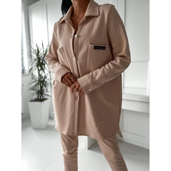 Three pieces set Comfy and Sexy in beige  https://www.toromoda.com/products/womens-three-pieces-set-comfy-and-sexy-in-beige  Three pieces set of a long shirt type top with buttons and pockets, sweatpants with an elasticated waist and cuffs and two active pockets and a crop top.
