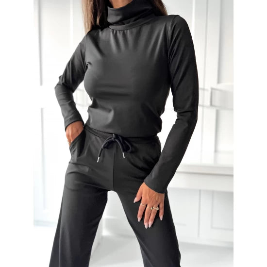 Ladies set Mel in two parts by ToroModa  https://www.toromoda.com/products/ladies-set-mel  Women's set with black polo top with thumb holes and trousers with straight legs, elastic waist, ties. Fabric: polyamide, spandexMade by ToroModa