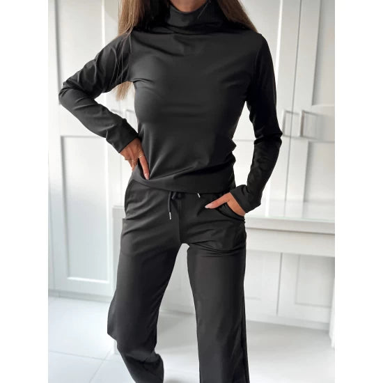 Ladies set Mel in two parts by ToroModa  https://www.toromoda.com/products/ladies-set-mel  Women's set with black polo top with thumb holes and trousers with straight legs, elastic waist, ties. Fabric: polyamide, spandexMade by ToroModa