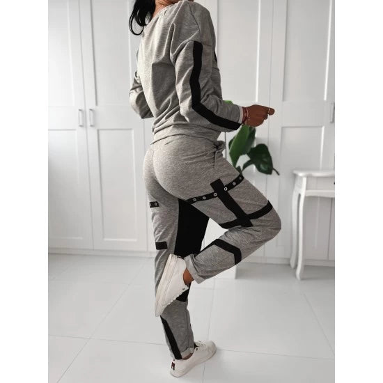 Woman's set Selena in gray  https://www.toromoda.com/products/womans-set-selena  Women's set mix of colors in gray and black. Two active pockets on the bottom.Upper part free cut. Spectacular eyelets.Fabric: cotton with elastaneProducer: BG