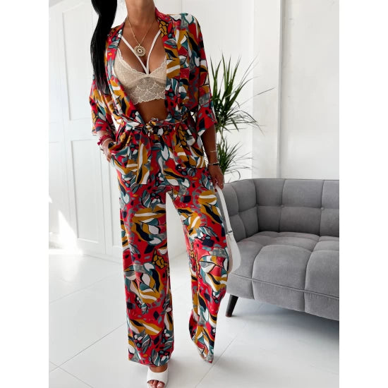 Casablanca Kimono Pants Set by ToroModa  https://www.toromoda.com/products/womans-kimono-pants-set  Unique set of two parts:Pants freestyle with elastic waist. Kimono with ruffled sleeves, knees and waistbands.Material: polyester, elastaneProduced by: ToroModa