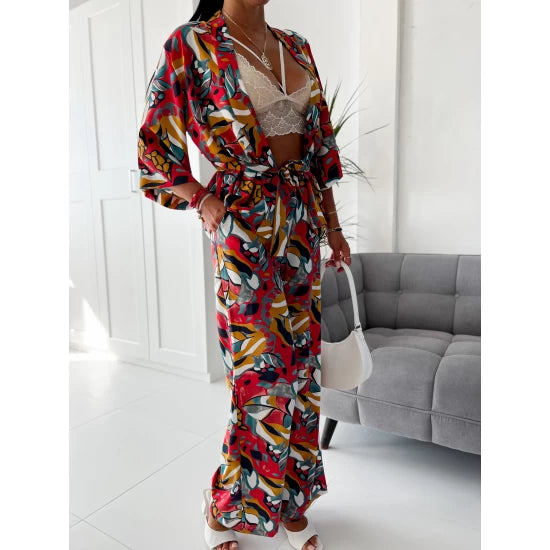 Casablanca Kimono Pants Set by ToroModa  https://www.toromoda.com/products/womans-kimono-pants-set  Unique set of two parts:Pants freestyle with elastic waist. Kimono with ruffled sleeves, knees and waistbands.Material: polyester, elastaneProduced by: ToroModa