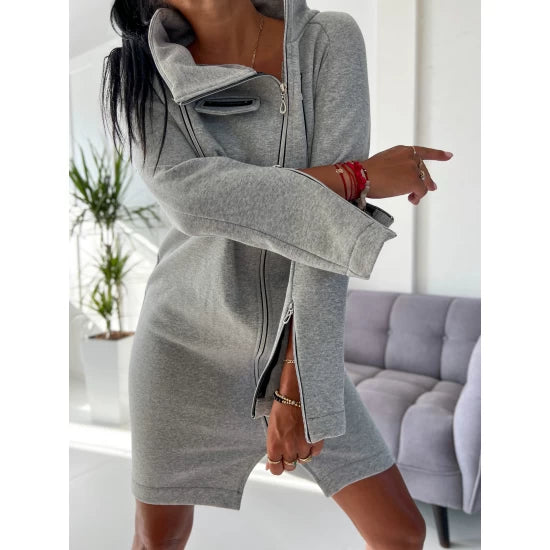 Women's Cozy Zip Up Sweatshirt Dress  https://www.toromoda.com/products/womens-cozy-zip-up-sweatshirt-dress  A beautiful sweater-dress model made of soft, slightly quilted cotton fabric. Zip fastening, high collar, active sleeve zips, active flap pocket. Fabric: