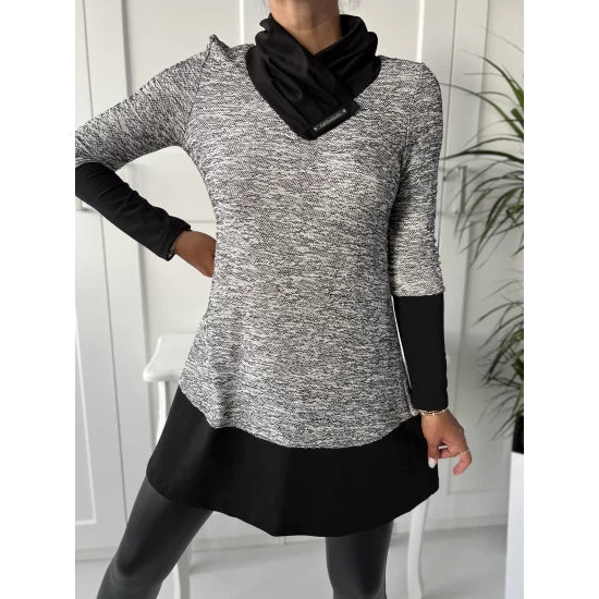 Women's knitted tunic with a spectacular collar  https://www.toromoda.com/products/womens-knitted-tunic-with-a-spectacular-collar  A beautiful tunic pattern in a soft knit with a beautifully gathered collar, cuffs and hem in cotton, loose fit.Material: cotton, elastane, knitwearOrigin: ToroModa