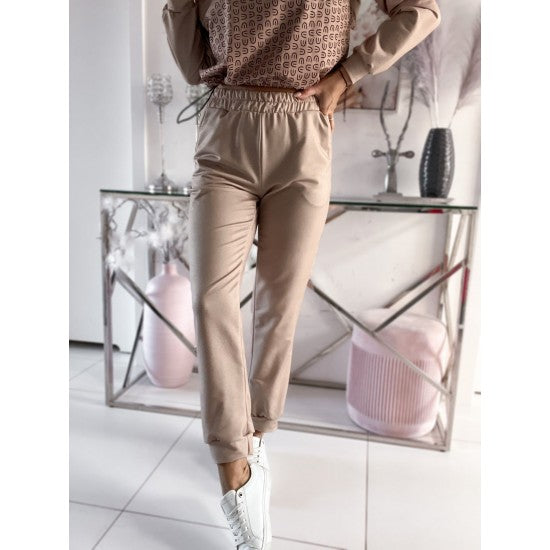 Ladies set Moka in two parts in beige  https://www.toromoda.com/products/womans--set-moka  Two-piece set: hooded and elasticated sweatshirt with hem stoppers and sweatpants with cuffs and side pockets .Material: cotton, polyester, elastane