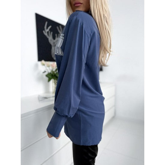 Women's Puff Sleeve Shirt in Blue  https://www.toromoda.com/products/womens-puff-sleeve-shirt-in-blue  A beautiful shirt pattern with an interesting asymmetric fastening, cut pattern, cuff and sleeve button. Material: cotton