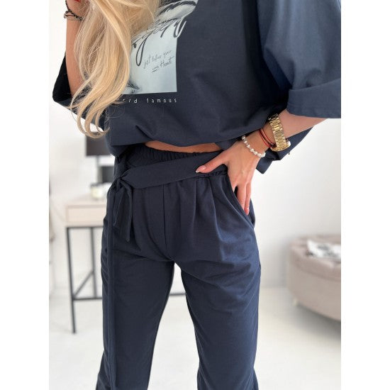 Women's two pieces set Kate in dark blue  https://www.toromoda.com/products/womens-set-kate-in-dark-blue  Two-piece set: loose blouse with boat neck and pants with pockets, elastic waist, ties. Material: cotton with elastane Origin:&nbsp;ToroModa