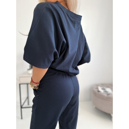 Women's two pieces set Kate in dark blue  https://www.toromoda.com/products/womens-set-kate-in-dark-blue  Two-piece set: loose blouse with boat neck and pants with pockets, elastic waist, ties. Material: cotton with elastane Origin:&nbsp;ToroModa