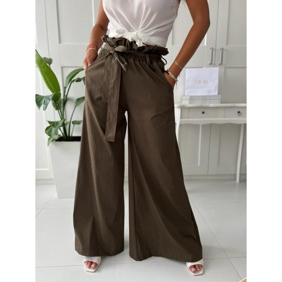 Womens Flare pants in brown  https://www.toromoda.com/products/womens-flare-pants-in-brown  Unique trousers with wide legs, elastic waist, belt, side pockets.Material: textile without elastaneOrigin: BG