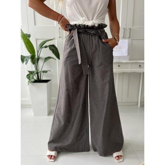 Womens Flare pants in graphite  https://www.toromoda.com/products/womens-flare-pants-in-graphite  Unique trousers with wide legs, elastic waist, belt, side pockets.Material: textile without elastaneOrigin: BG