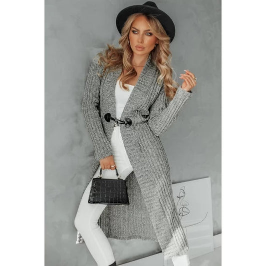Long women's cardigan Maya by ToroModa  https://www.toromoda.com/products/womans-long-cardigan-maya  A lovely long cardigan with a clean silhouette and a beautiful button fastening.Material: kniteOrigin: ToroModa