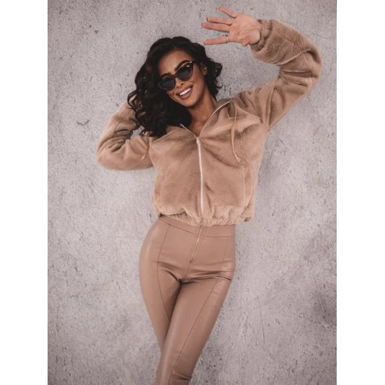 Teddy Bear Jacket in brown by ToroModa  https://www.toromoda.com/products/women-s-teddy-bear-jacket  A great fluffy jacket with a hood and catchy ears. Zip fastening, lined.Outer: PolyesterLining: PolyesterOrigin: ToroModa Bulgaria