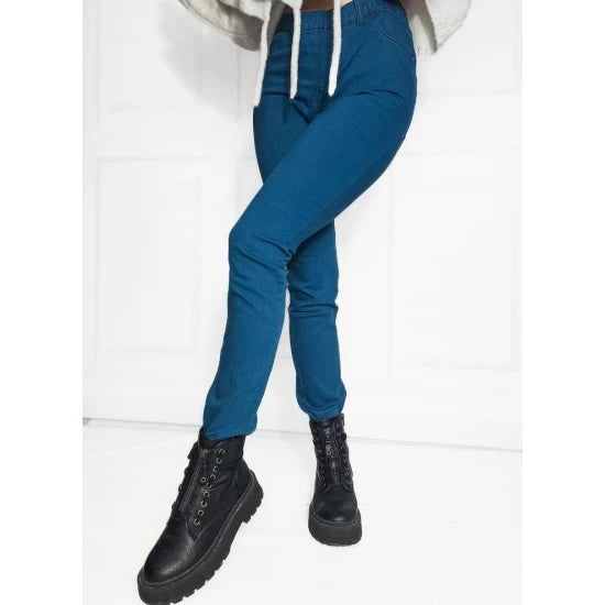 Leggings pants in blue by ToroModa  https://www.toromoda.com/products/women-s-leggings-pants-in-blue  Jeans type trousers with an elastic waist, two active back pockets.Material: cotton, polyester, elastane Model is wearing size S.