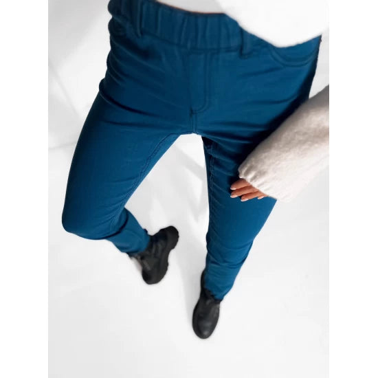 Leggings pants in blue by ToroModa  https://www.toromoda.com/products/women-s-leggings-pants-in-blue  Jeans type trousers with an elastic waist, two active back pockets.Material: cotton, polyester, elastane Model is wearing size S.