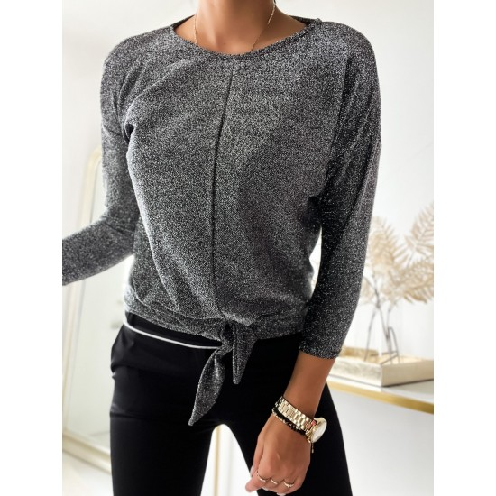 Sparkly crop top blouse in gray by ToroModa  https://www.toromoda.com/products/womans-sparkly-crop-top-blouse  Introducing our exquisite blouse, a must-have addition to your wardrobe. Crafted with meticulous attention to detail, this blouse embodies elegance and style.