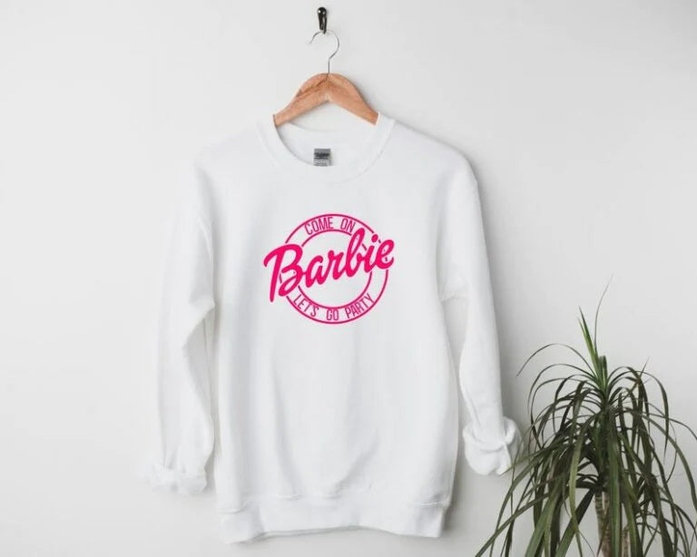 Women's blouse Barbie Let’s Go Party - ToroModa  https://www.toromoda.com/products/womens-blouse-barbie-let-s-go-party  The blouse is designed for winter with 100% cotton fabric for maximum warmth and comfort. Its round neckline and loose fit create a flattering silhouette...