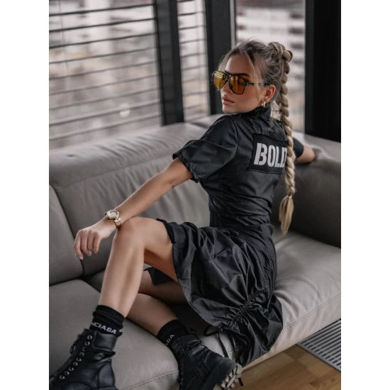 Black dress with laces BOLD By ToroModa  https://www.toromoda.com/products/women-s-black-dress-with-laces-bold  Avangard model of a black dress with a zipper, a tie to adjust the bottom for an asymmetrical look.