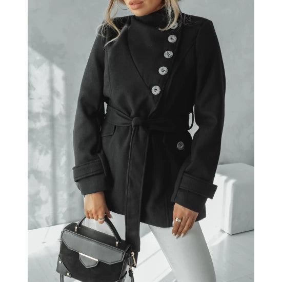 Elegant coat with buttons by ToroModa  https://www.toromoda.com/products/womens-elegant-coat-with-buttons  Beautiful belted woolen coat, lined, slim fit.Flap pockets, asymmetric fastening, face placket.Material: wool, liningOrigin: ToroModa