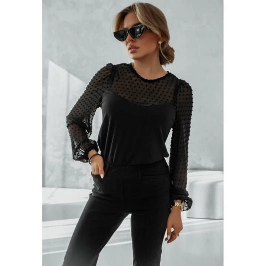 Formal black blouse with tulle sleeves  https://www.toromoda.com/products/womens-black-blouse-with-tulle-sleeves  Elegant women's blouse with a delicate tulle with embroidery. Mid length, fitted cut, button fastening at back.