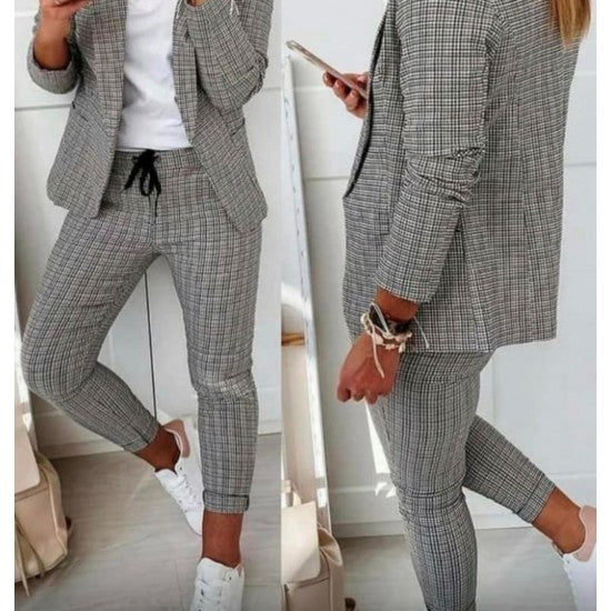 Women's set Squares in two parts  https://www.toromoda.com/products/womens-set-squares  Women's set of jacket and pants in a square with ties. Fabric: cotton, polyester Origin: ToroModa & nbsp;