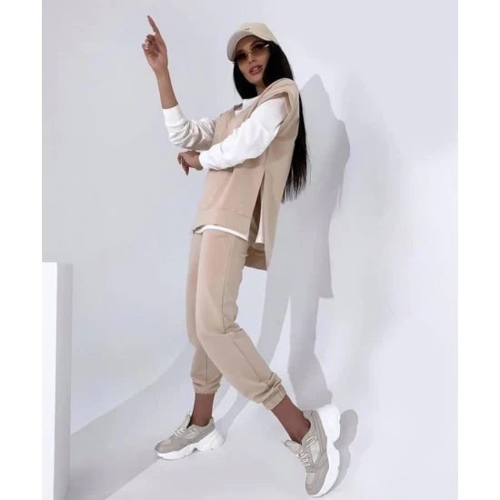 Women's three-piece set Anelia By ToroModa  https://www.toromoda.com/products/womens-three-piece-set-anelia  Amazing set of white blouse, sweatpants with elastic waist and cuffs and two active pockets and a beautiful sleeveless vest blouse with large side slits.