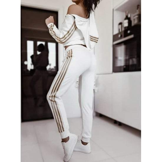 Black or White with Gold Straps Workout Set  https://www.toromoda.com/products/two-pieces-workout-set  Two Piece Set tops+pantsTwo sides zip on the necklineSoft and cuteExcellent qualitiesTrue sizesCold wash and drySize: M, L, XL