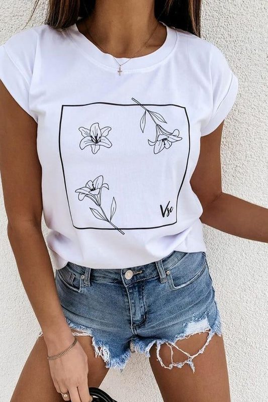 Women's T-Shirt Daffodils in White  https://www.toromoda.com/products/womens-t-shirt-daffodils-in-white  Women's T-shirt with round neckline and free cut. Combines well with elegant, sporty-elegant and casual wear. The t-shirts falls freely on the body.