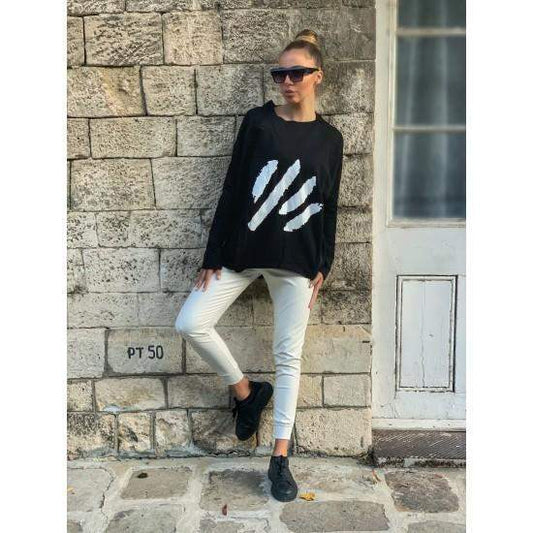 Sweater Black  https://www.toromoda.com/products/sweater-black  Abstract print Sweater Oversized tunic ,soft cotton , abstract painting in front , low high , pullover , bottom side zips, hoodie. Fabric: cotton and elastane