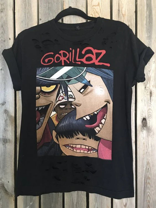 Men's Gorillaz in black - ToroModa  https://www.toromoda.com/products/mens-gorillaz  Men's t-shirt with a round neckline and a loose fit. The material of the T-shirt is extremely soft and provides maximum comfort during summer days.100% cotton