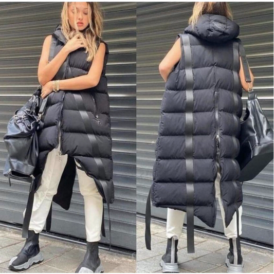 Women's Black Vest  https://www.toromoda.com/products/womens-black-vest  A unique waistcoat with an elongated back and shortened front. Active back zip, hood, zip fastening.Pockets and spectacular edges along the entire length.