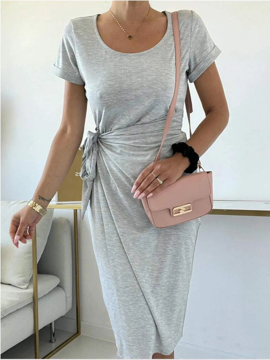 Women's Soft Gray Dress - ToroModa  https://www.toromoda.com/products/womens-soft-gray-dress  Gentle women's dress of medium length, clean silhouette, spectacular cut with a cover in the front, tying the waist with a belt.Fabric: cotton with elastane.