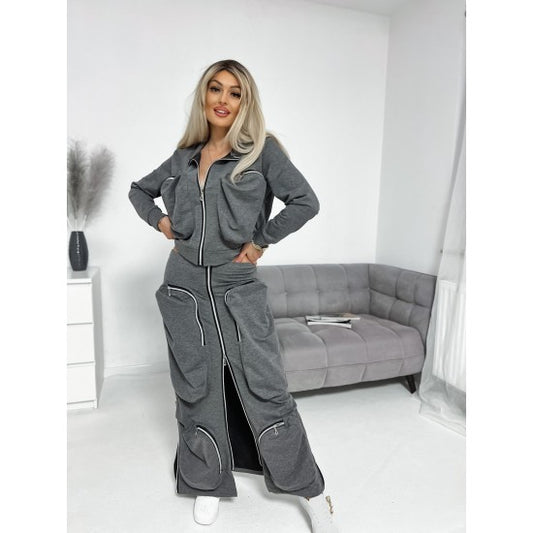 Avant-garde jacket and skirt set in gray  https://www.toromoda.com/products/avant-garde-jacket-and-skirt-set-in-gray  A unique two-piece set: jacket with a pop collar, zip fastening, large pockets long skirt with elastic waist, full length active zip, large zipped pockets