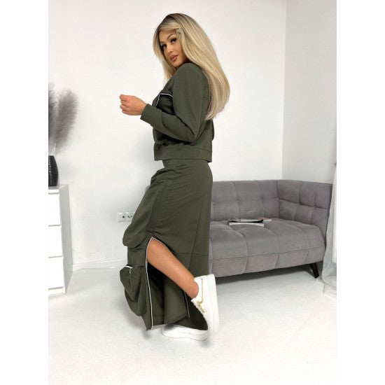 Avant-garde jacket and skirt set in oil green  https://www.toromoda.com/products/avant-garde-jacket-and-skirt-set-in-oil-green  A unique two-piece set: jacket with a pop collar, zip fastening, large pockets long skirt with elastic waist, full length active zip, large zipped pockets