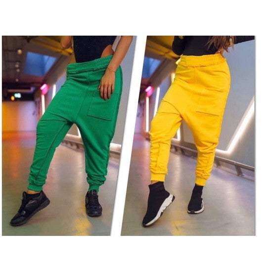 Drop crotch pants with a cuff in green and yellow  https://www.toromoda.com/products/women-drop-crotch-pants-with-a-cuff-in-green-and-yellow  Unique pants with large, spectacular pocket, outer seams and cuffs on the legs.Colorful mood for spring.Fabric: three-pointed cotton woolOrigin: BG